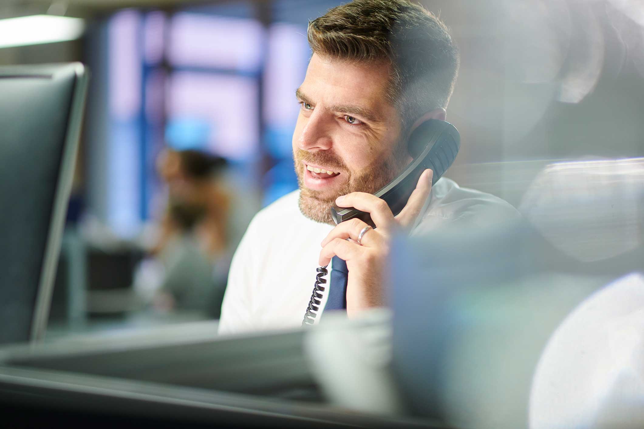 Contact-us-page-Man-on-phone--iStock-1092932090