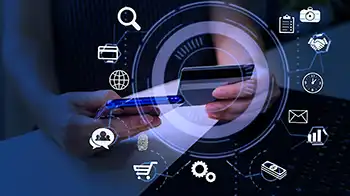 Hand holding a credit card through an opening surrounded by digital icons.